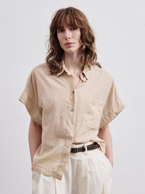 Sleeveless shirt in cotton muslin